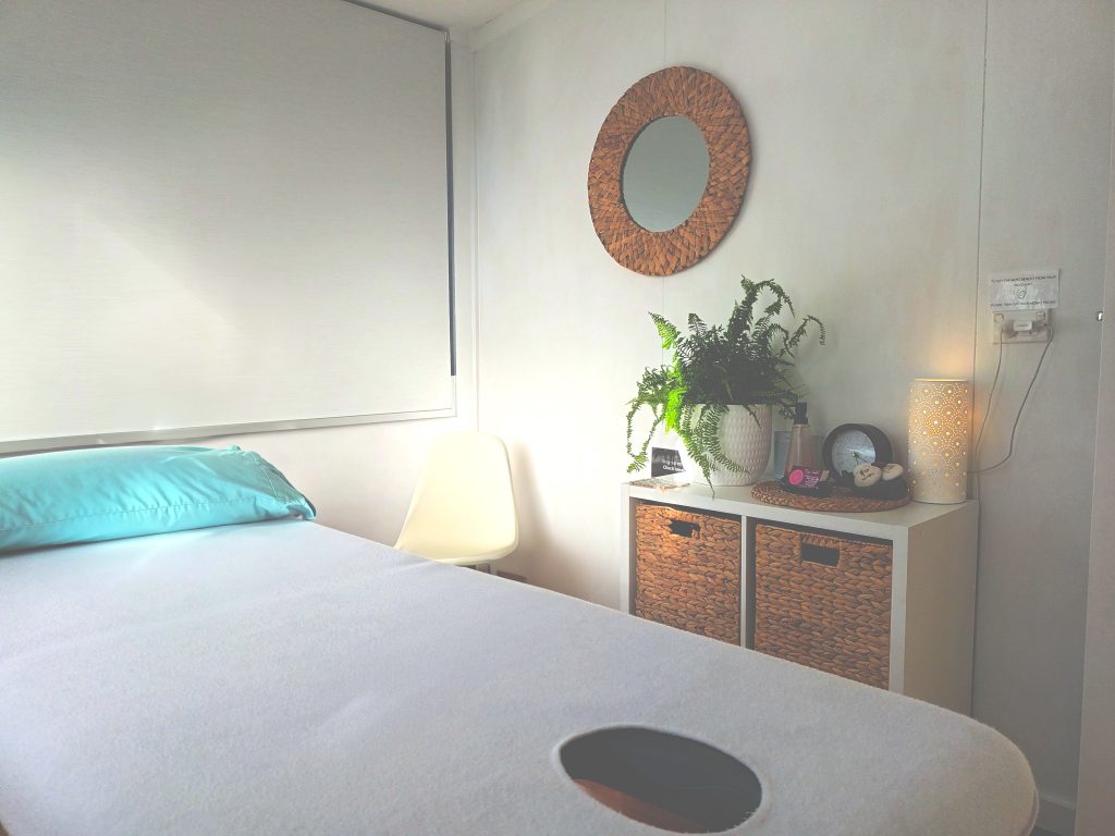 Cozy massage therapy room in Cairns, equipped for remedial and deep tissue massages to relax and rejuvenate clients